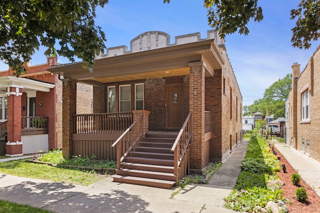 1318 S 61st Ct, Cicero, IL 60804 - view of front of property featuring brick siding and covered porch