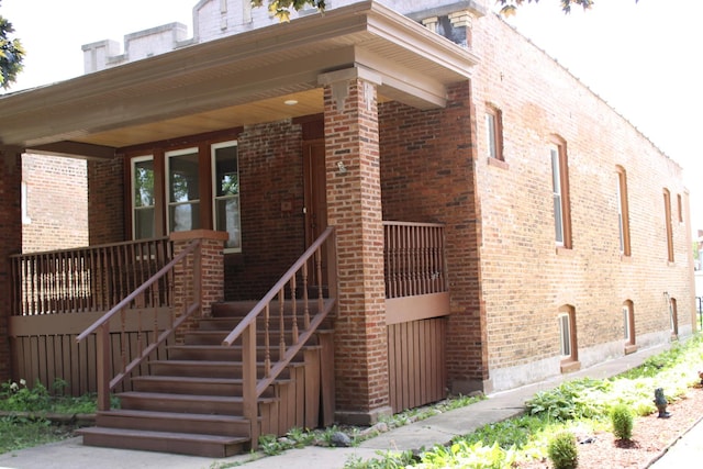1318 S 61st Ct, Cicero, IL 60804 - view of exterior entry with brick siding and covered porch