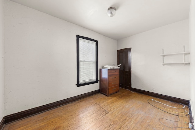 1318 S 61st Ct, Cicero, IL 60804 - unfurnished room featuring light wood finished floors and baseboards