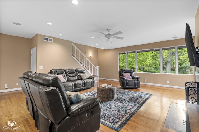 1886 N Springview Dr, Kankakee, IL 60901 - living room featuring stairway, ceiling fan, light wood-style flooring, and recessed lighting