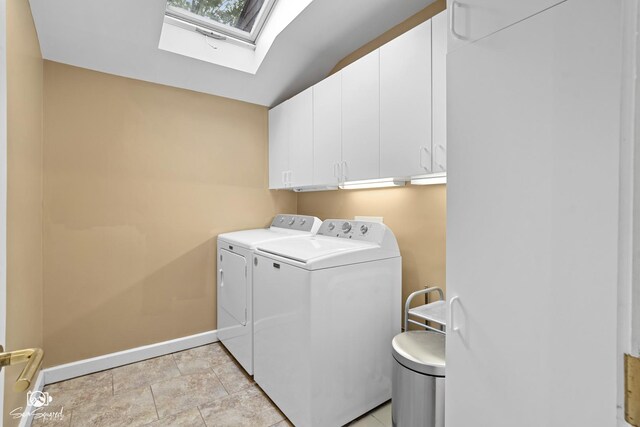 1886 N Springview Dr, Kankakee, IL 60901 - laundry room with a skylight, washer and clothes dryer, and cabinet space