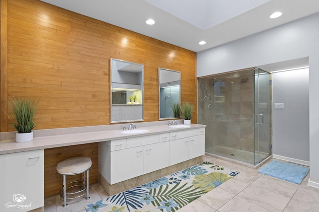 1886 N Springview Dr, Kankakee, IL 60901 - full bathroom featuring double vanity, recessed lighting, a shower stall, tile patterned floors, and wooden walls