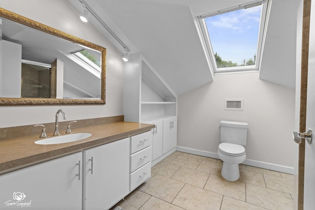 1886 N Springview Dr, Kankakee, IL 60901 - full bathroom with vanity, track lighting, a shower with door, and a skylight