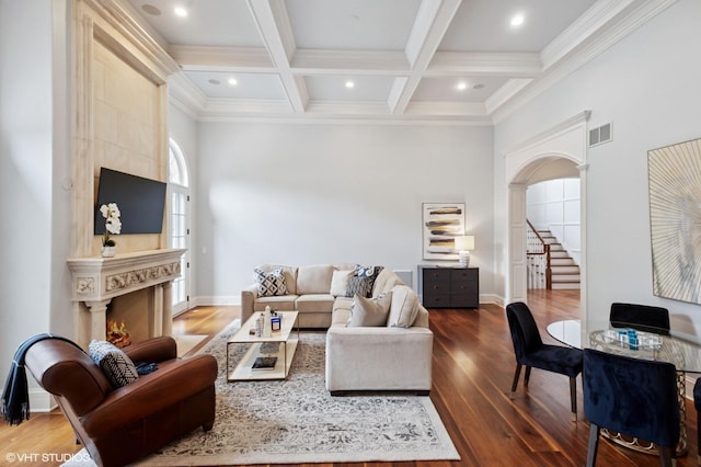 78 Wagner Rd, Northfield, IL 60093 - living room featuring arched walkways, beam ceiling, wood finished floors, ornamental molding, and coffered ceiling