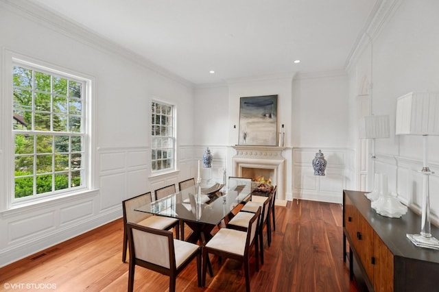 78 Wagner Rd, Northfield, IL 60093 - dining room featuring a decorative wall, plenty of natural light, ornamental molding, wood finished floors, and a wainscoted wall