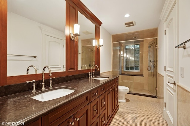 78 Wagner Rd, Northfield, IL 60093 - bathroom featuring double vanity, a stall shower, and tile patterned flooring