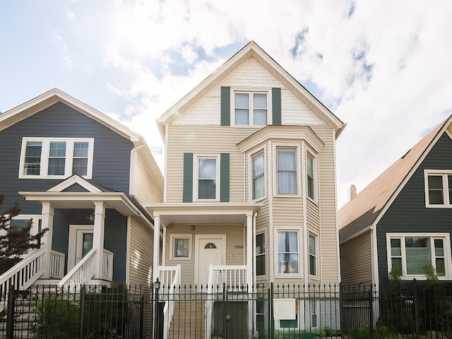 1718 N Kimball Ave, Chicago, IL 60647 - view of front of home with covered porch and a fenced front yard