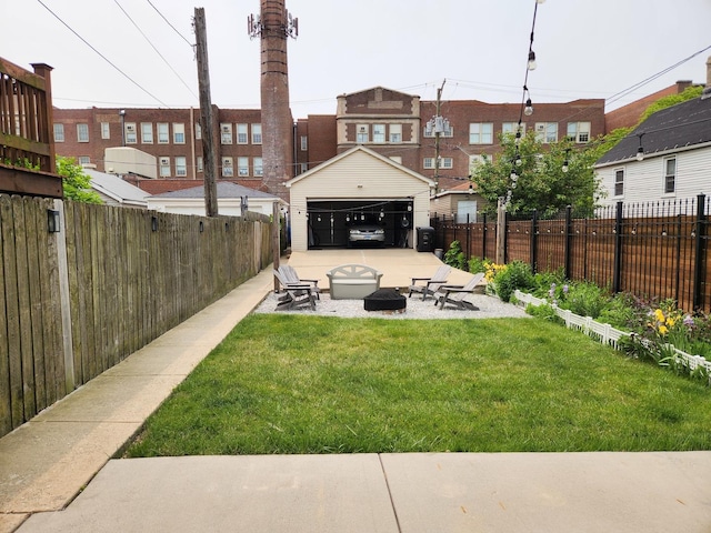 1718 N Kimball Ave, Chicago, IL 60647 - fenced backyard with a fire pit, a garage, a patio, and a residential view