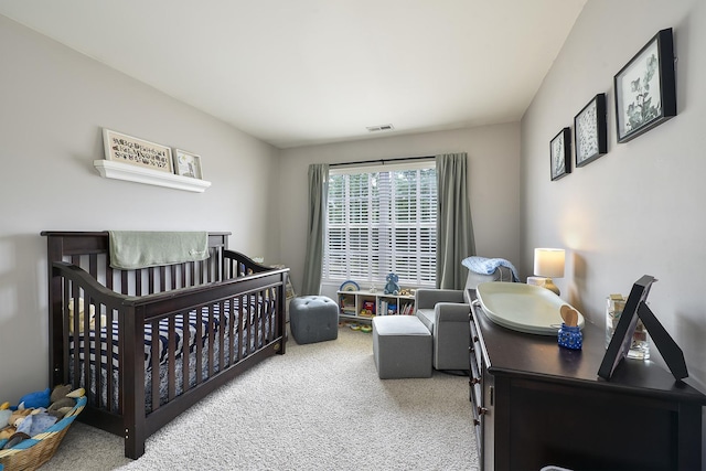 2131 Claremont Ln, Lake In The Hills, IL 60156 - bedroom featuring carpet and a crib
