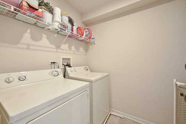 2131 Claremont Ln, Lake In The Hills, IL 60156 - laundry room featuring washer and dryer and light tile patterned floors