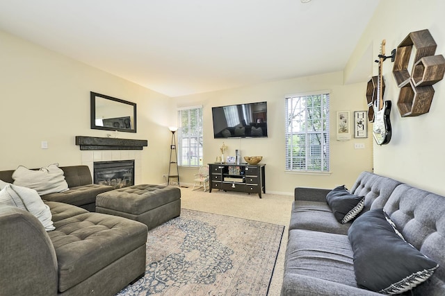 2131 Claremont Ln, Lake In The Hills, IL 60156 - carpeted living room with a fireplace and baseboards