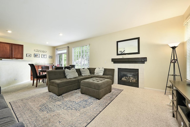 2131 Claremont Ln, Lake In The Hills, IL 60156 - living room featuring a fireplace, light carpet, and recessed lighting