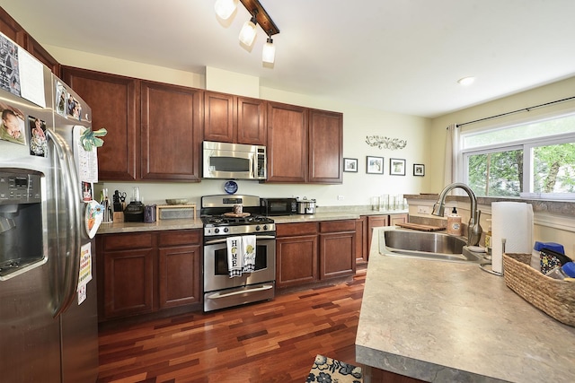 2131 Claremont Ln, Lake In The Hills, IL 60156 - kitchen with appliances with stainless steel finishes, dark wood finished floors, light countertops, and recessed lighting