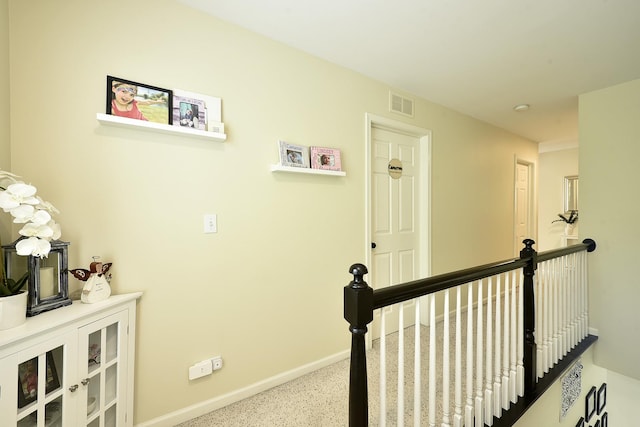 2131 Claremont Ln, Lake In The Hills, IL 60156 - hall featuring an upstairs landing and baseboards