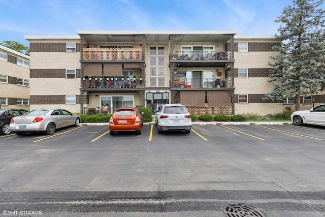 935 8th Ave Unit 1, La Grange, IL 60525 - view of apartment building / complex featuring uncovered parking