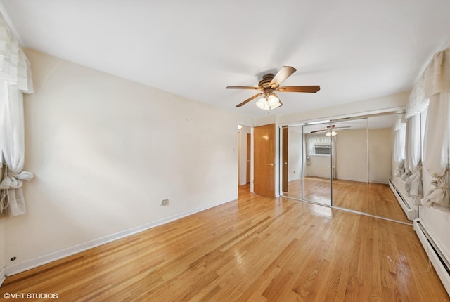 935 8th Ave Unit 1, La Grange, IL 60525 - unfurnished bedroom featuring a baseboard heating unit, light wood-type flooring, a closet, and ceiling fan