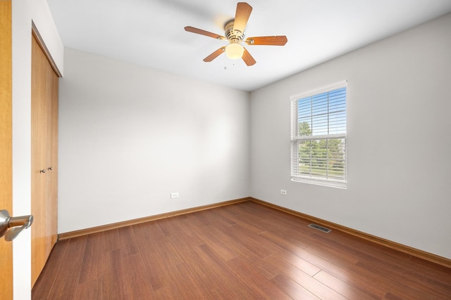 1301 Bridgehampton Dr, Plainfield, IL 60586 - spare room featuring wood finished floors and ceiling fan
