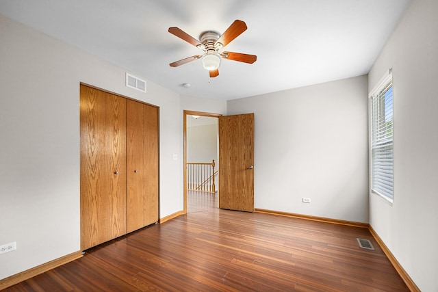 1301 Bridgehampton Dr, Plainfield, IL 60586 - unfurnished bedroom featuring wood finished floors, a closet, and a ceiling fan