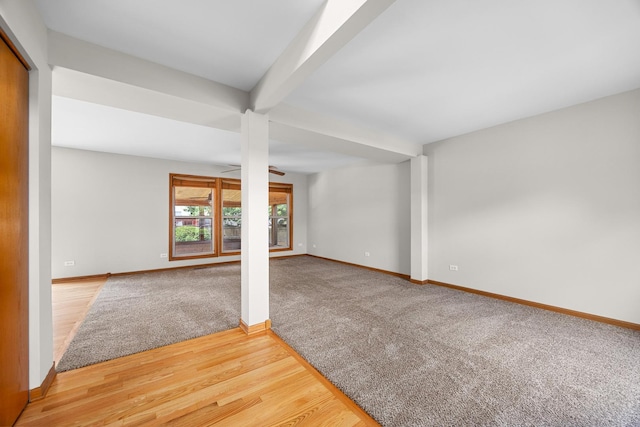 1301 Bridgehampton Dr, Plainfield, IL 60586 - carpeted empty room featuring beam ceiling and wood finished floors