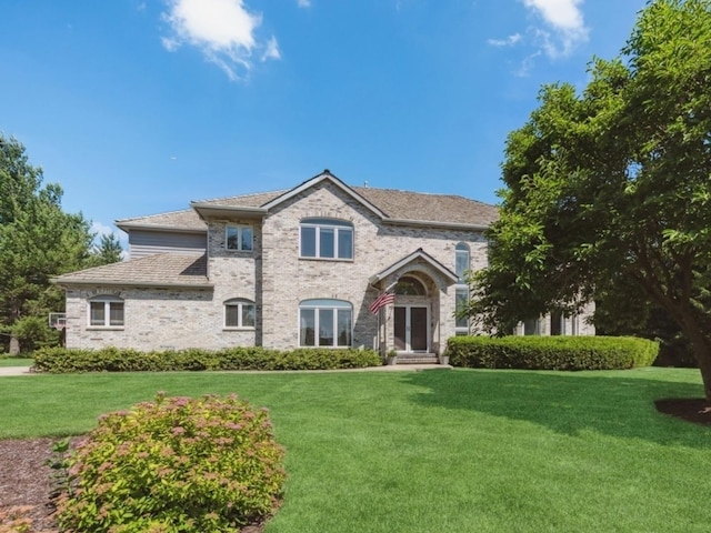 1551 Daybreak Dr, Libertyville, IL 60048 - french country style house with a front lawn