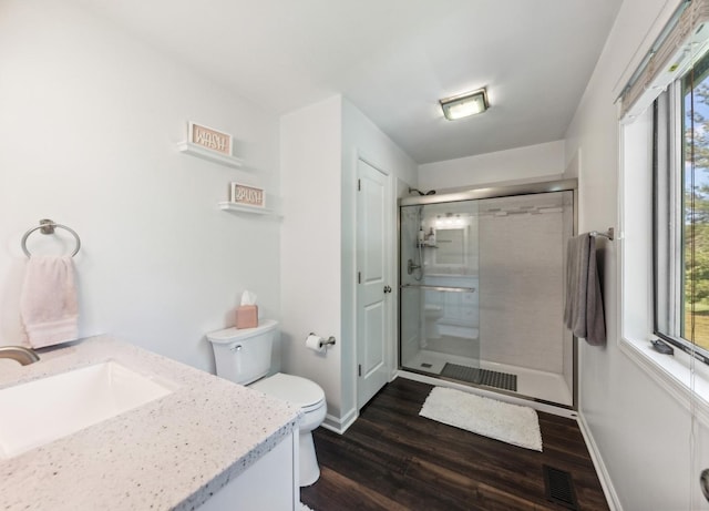 1551 Daybreak Dr, Libertyville, IL 60048 - bathroom with vanity, a stall shower, and wood finished floors