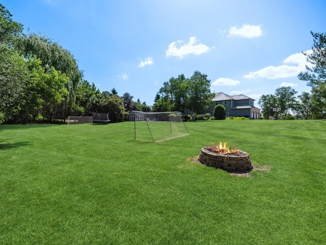 1551 Daybreak Dr, Libertyville, IL 60048 - view of yard with a sport area and an outdoor fire pit
