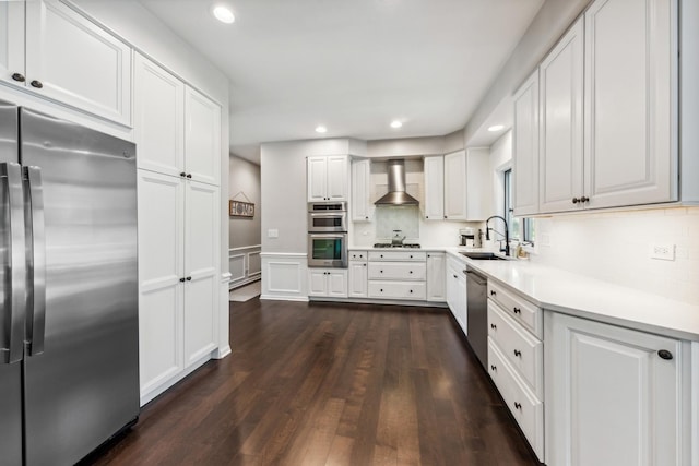 1551 Daybreak Dr, Libertyville, IL 60048 - kitchen featuring stainless steel appliances, wall chimney range hood, white cabinets, backsplash, and recessed lighting