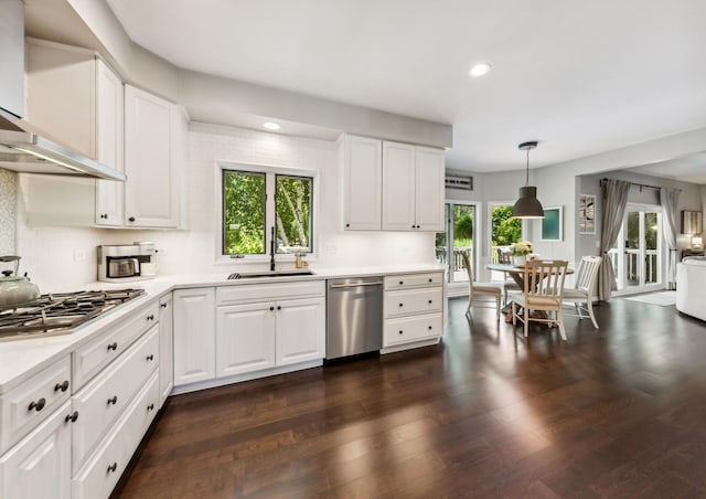1551 Daybreak Dr, Libertyville, IL 60048 - kitchen featuring appliances with stainless steel finishes, wall chimney exhaust hood, recessed lighting, light countertops, and white cabinets