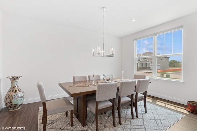 12906 S Sydney Cir, Plainfield, IL 60585 - dining space featuring a chandelier and wood finished floors