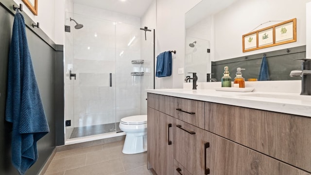 3124 S Benson St Unit 6, Chicago, IL 60608 - full bathroom with double vanity, a stall shower, and tile patterned flooring