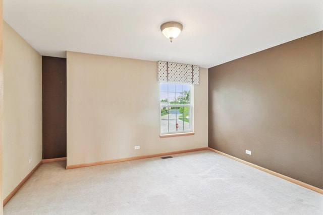 8610 Pebble Creek Ct, Wonder Lake, IL 60097 - empty room featuring baseboards and light carpet