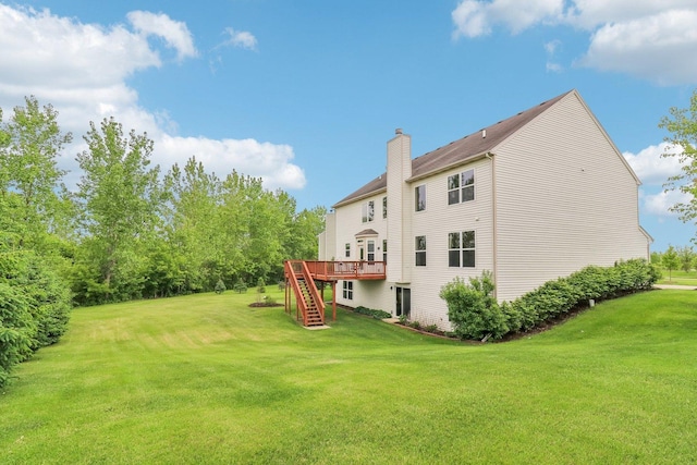 8610 Pebble Creek Ct, Wonder Lake, IL 60097 - back of property featuring stairway, a wooden deck, a chimney, and a yard
