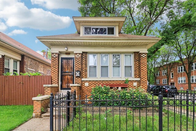 7659 S Rhodes Ave, Chicago, IL 60619 - bungalow featuring brick siding