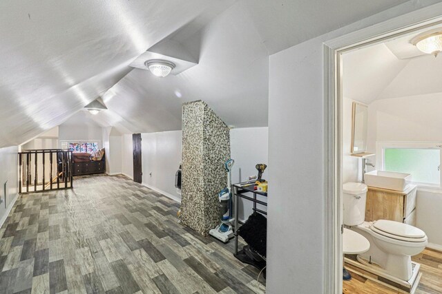 7659 S Rhodes Ave, Chicago, IL 60619 - bonus room featuring vaulted ceiling and wood finished floors