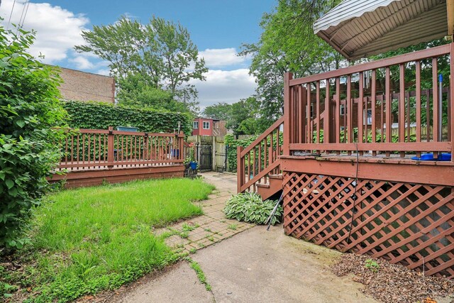 7659 S Rhodes Ave, Chicago, IL 60619 - view of yard with a wooden deck