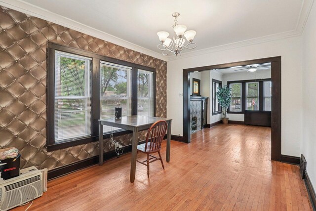 7659 S Rhodes Ave, Chicago, IL 60619 - dining room with a chandelier, ornamental molding, wood-type flooring, and healthy amount of natural light