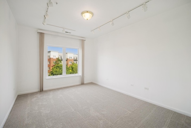 820 Weidner Rd Unit 405, Buffalo Grove, IL 60089 - carpeted empty room with rail lighting and baseboards