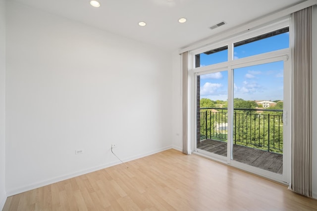 820 Weidner Rd Unit 405, Buffalo Grove, IL 60089 - spare room with plenty of natural light, light wood-style floors, recessed lighting, and a wall of windows