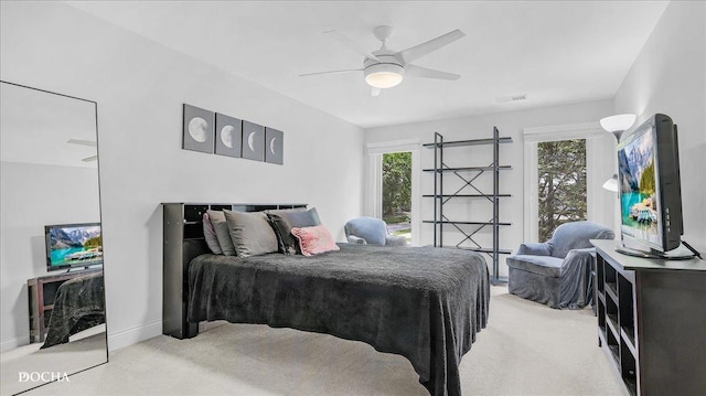 2051 Creekside Dr Unit 2-3, Wheaton, IL 60189 - bedroom with light carpet and ceiling fan