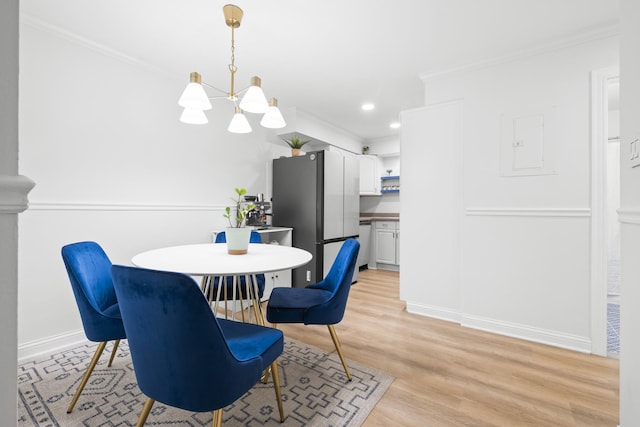 429 Wesley Ave Unit 301, Oak Park, IL 60302 - dining area featuring ornamental molding, a chandelier, light wood finished floors, recessed lighting, and electric panel