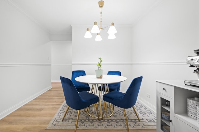429 Wesley Ave Unit 301, Oak Park, IL 60302 - dining space with a chandelier, ornamental molding, and light wood-style flooring
