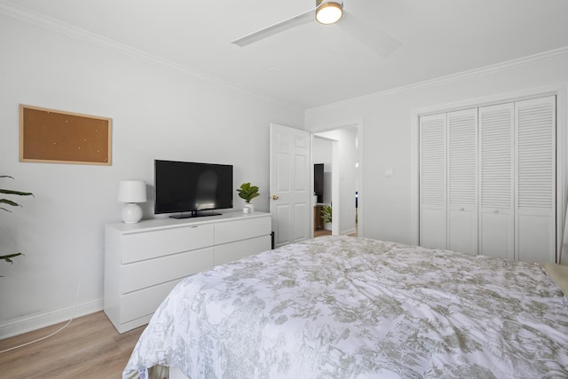 429 Wesley Ave Unit 301, Oak Park, IL 60302 - bedroom featuring ornamental molding, light wood finished floors, a closet, and ceiling fan