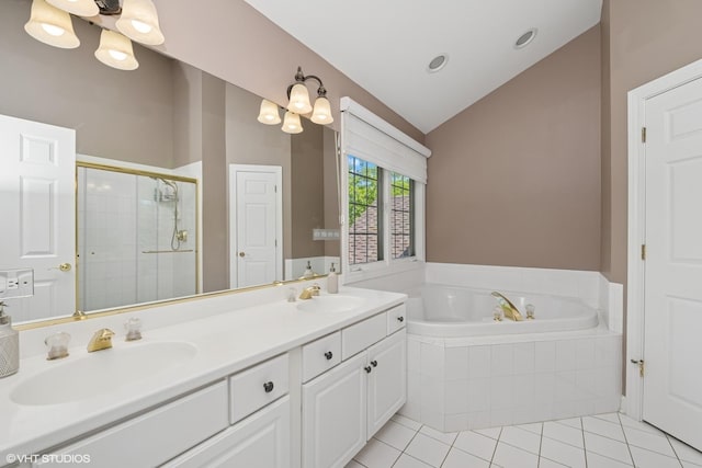 bathroom featuring lofted ceiling, a shower stall, a bath, tile patterned flooring, and double vanity
