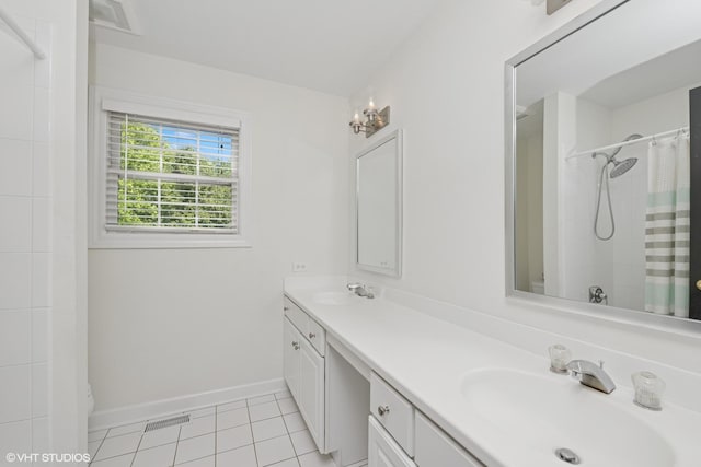 bathroom with double vanity, tile patterned floors, and a shower with shower curtain