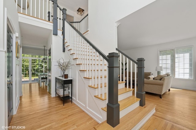 stairway featuring wood finished floors