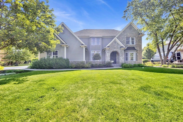 7270 Bannockburn Cir, Lakewood, IL 60014 - view of front of home featuring stone siding and a front lawn