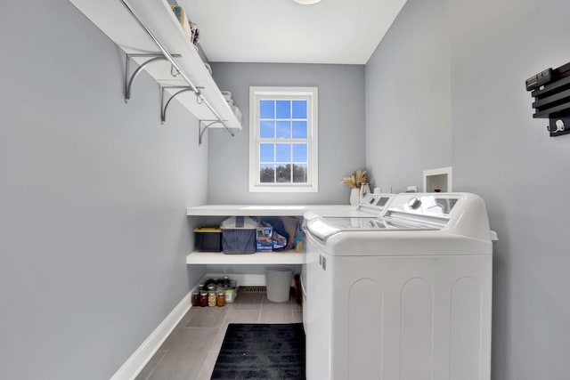7270 Bannockburn Cir, Lakewood, IL 60014 - laundry area featuring separate washer and dryer and baseboards