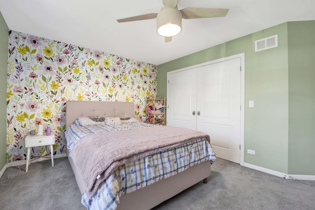 7270 Bannockburn Cir, Lakewood, IL 60014 - bedroom with carpet, a closet, ceiling fan, and wallpapered walls