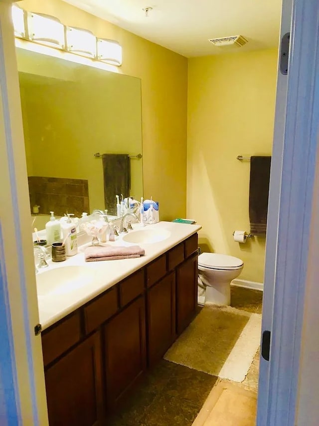 77 N Quentin Rd Unit 202, Palatine, IL 60067 - bathroom with vanity and toilet