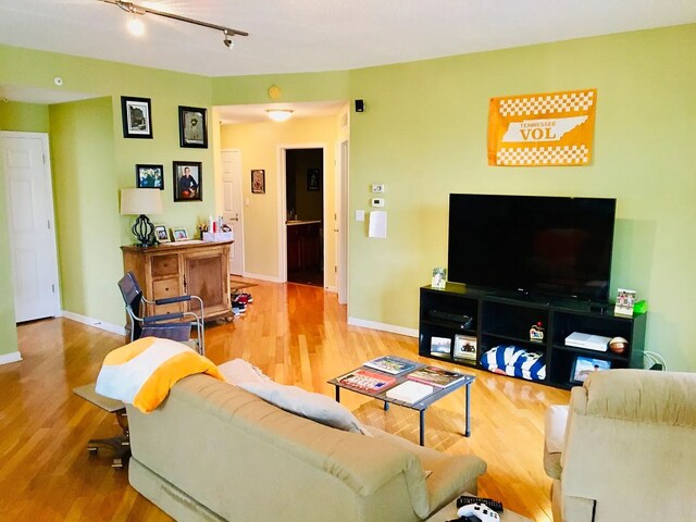 77 N Quentin Rd Unit 202, Palatine, IL 60067 - living room featuring wood finished floors and rail lighting